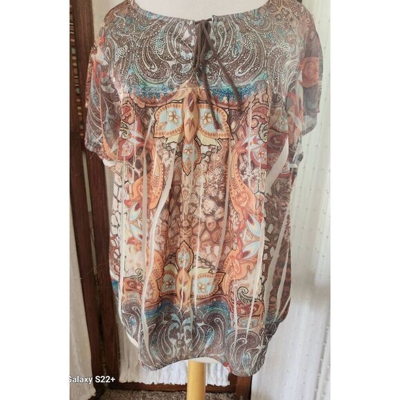 F86 One World 'live and let live' orange and brown with sparkly silver stud deco - Picture 1 of 11